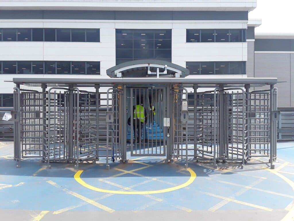 Turnstile system at a secured building entry point